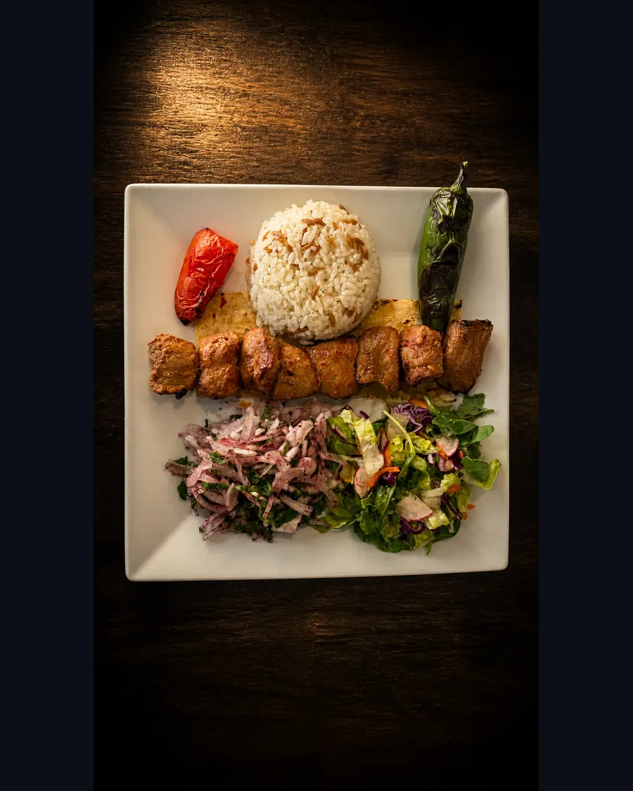 Shish kebab plate with rice and salad