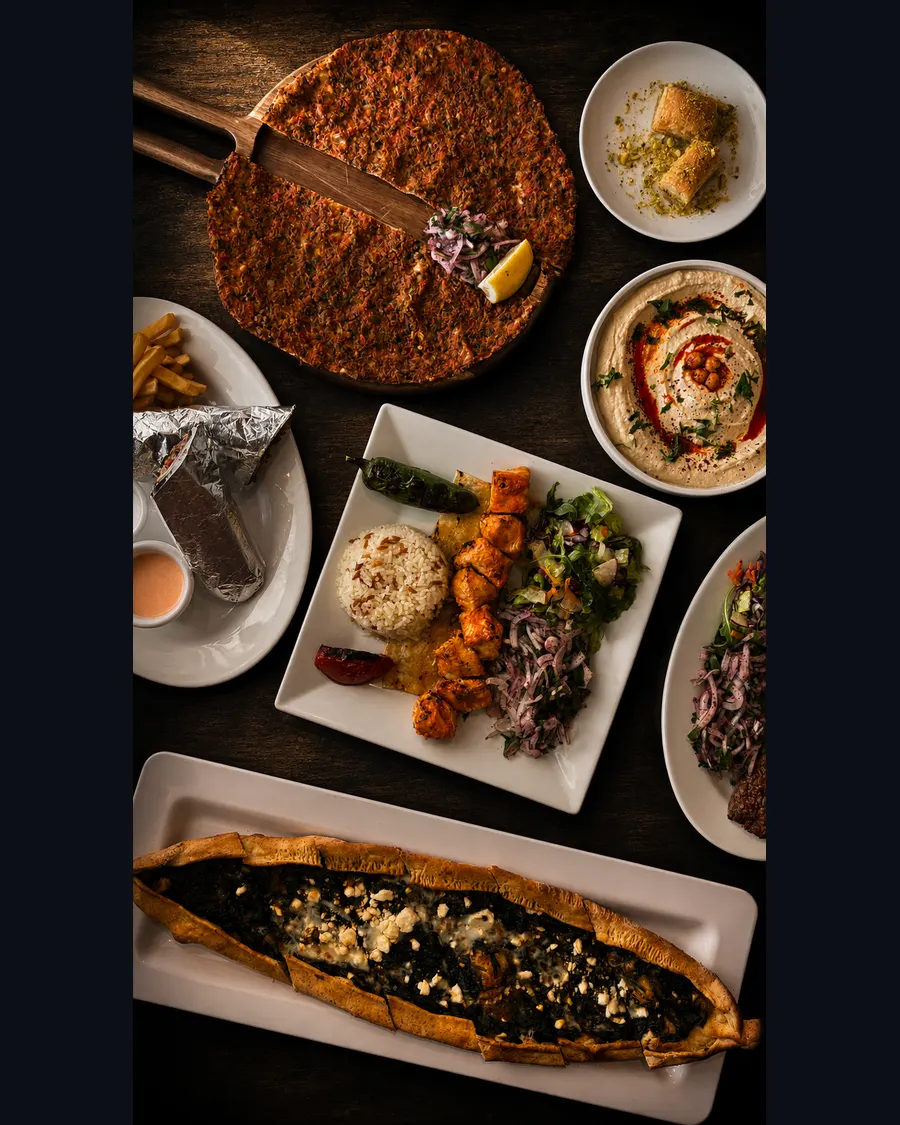 Lahmacun, kebab, hummus and pide table spread