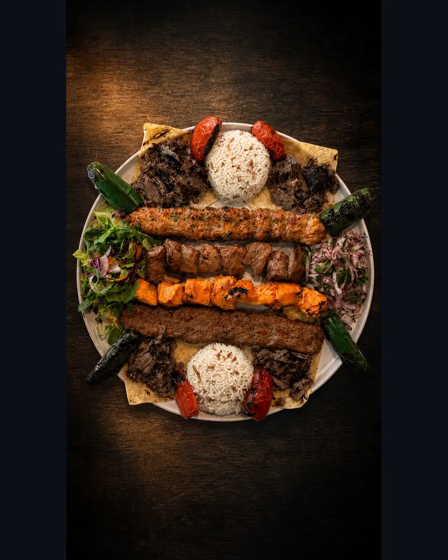 Large mixed grill platter with kebabs, döner, rice and salad