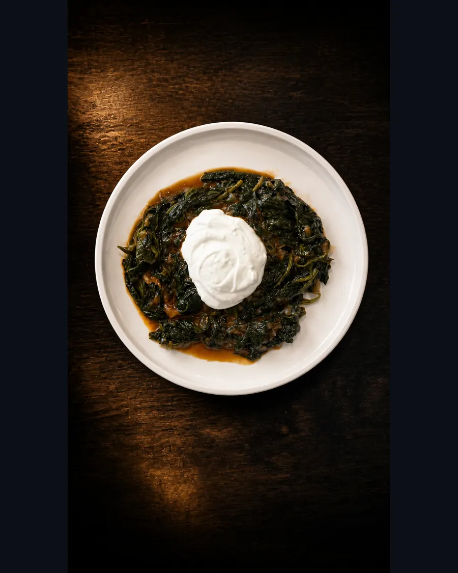 Spinach meze topped with yogurt